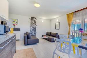 Χώρος καθιστικού στο Apartments & Rooms Laganini SARA