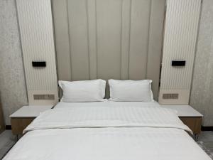 Aram Hotel客房内的一张或多张床位