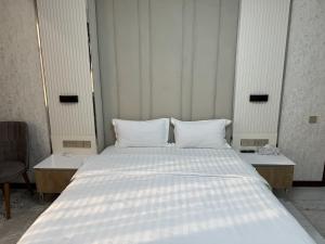 Aram Hotel客房内的一张或多张床位