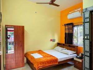 Katil atau katil-katil dalam bilik di Gokarna Thayi Krupa Homestay