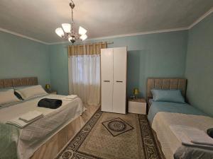 Postel nebo postele na pokoji v ubytování Bob Marley Bnb & Hostel