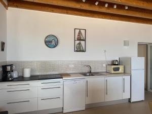 Vivienda Vacacional Casa Lina的厨房或小厨房