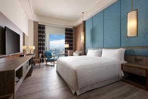 Ліжко або ліжка в номері Four Points By Sheraton Penghu