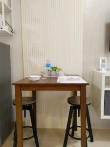 Kuhinja oz. manjša kuhinja v nastanitvi APT at G-207 in SMDC Cheer Residences