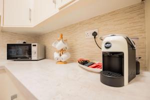 A cozinha ou kitchenette de Long Walk Gem