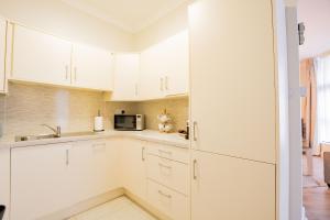 A cozinha ou kitchenette de Long Walk Gem