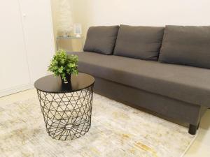 Predel za sedenje v nastanitvi APT at G-207 in SMDC Cheer Residences