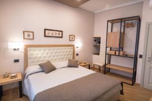 Postel nebo postele na pokoji v ubytování Brunelli B&B