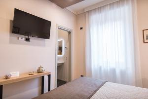 TV a/nebo společenská místnost v ubytování Brunelli B&B