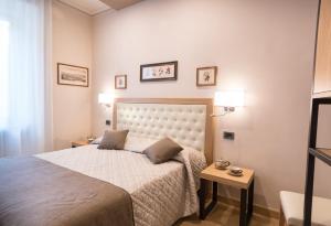 Postel nebo postele na pokoji v ubytování Brunelli B&B