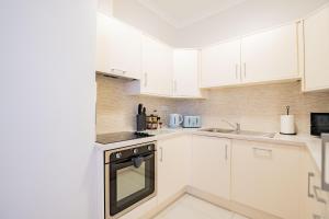 A cozinha ou kitchenette de Long Walk Gem