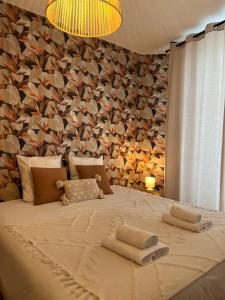 Postel nebo postele na pokoji v ubytování "Le Charleville", Superbe appartement, gare de Nevers, service premium by PRIMO C0NCIERGERIE