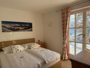 Postel nebo postele na pokoji v ubytování Villa Kitzbühel
