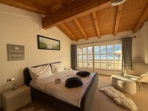 Postel nebo postele na pokoji v ubytování Villa Kitzbühel