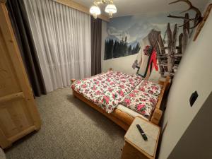 Posteľ alebo postele v izbe v ubytovaní Apartamenty na Galicówce
