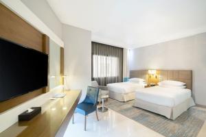 Postel nebo postele na pokoji v ubytování Four Points by Sheraton Makkah Al Naseem