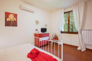 Postel nebo postele na pokoji v ubytování Cascina De' Fagiolari