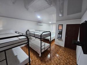 Postel nebo postele na pokoji v ubytování Hotel Luna Liberiana