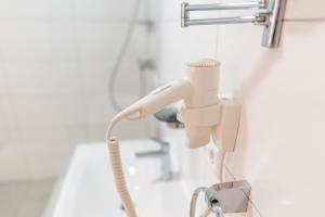 Koupelna v ubytování Planner Alpenhof + 20 fotografií