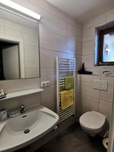 Koupelna v ubytování Pension Garni Appartement Ortner
