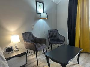 Posezení v ubytování Ștefan House 1
