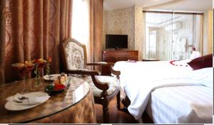 TV a/nebo společenská místnost v ubytování Pho Nui Hotel