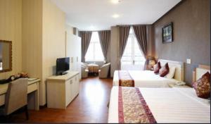 TV a/nebo společenská místnost v ubytování Pho Nui Hotel