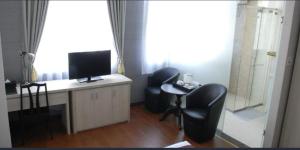 TV a/nebo společenská místnost v ubytování Pho Nui Hotel