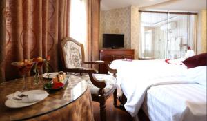 TV a/nebo společenská místnost v ubytování Pho Nui Hotel + 28 fotografií