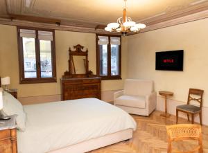 TV a/nebo společenská místnost v ubytování B&B al Torrione Belluno