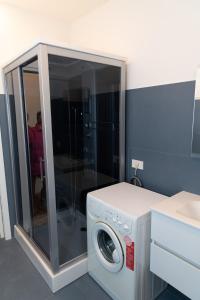 Postel nebo postele na pokoji v ubytování B&B al Torrione Belluno