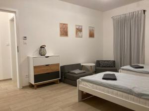 Postel nebo postele na pokoji v ubytování Apartmán Krkonoše Rokytnice