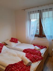 Postel nebo postele na pokoji v ubytování Apartamenty u Joli