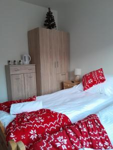 Postel nebo postele na pokoji v ubytování Apartamenty u Joli