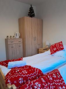 Postel nebo postele na pokoji v ubytování Apartamenty u Joli