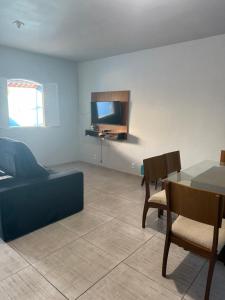 Μια τηλεόραση ή/και κέντρο ψυχαγωγίας στο Casa Azul 2 quartos