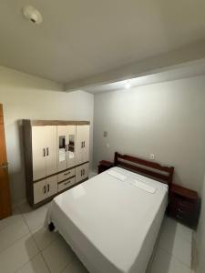 Ένα ή περισσότερα κρεβάτια σε δωμάτιο στο Casa Azul 2 quartos