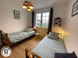 Postel nebo postele na pokoji v ubytování Brise de l ocean