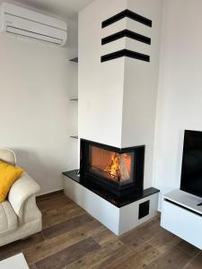 TV a/nebo společenská místnost v ubytování Treva Hotel & Apartaments