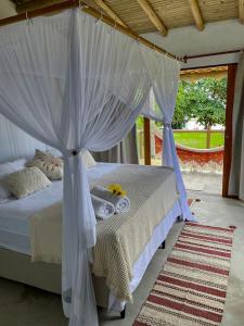 Ένα ή περισσότερα κρεβάτια σε δωμάτιο στο Casa Sereníssima