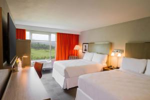 Cama o camas de una habitación en Four Points by Sheraton Caguas Real