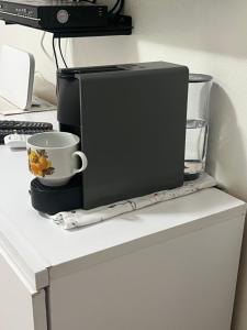 O bucătărie sau chicinetă la Chez Zeina - Studio Centre Ville
