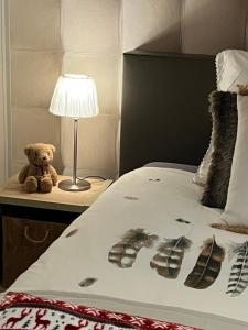 Ein Bett oder Betten in einem Zimmer der Unterkunft Le Chalet de Marguerite