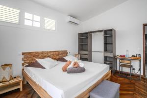 Una cama o camas en una habitación de Sublime Villa Piscine - Trésor de la Baie