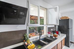 Una cocina o kitchenette en Sublime Villa Piscine - Trésor de la Baie