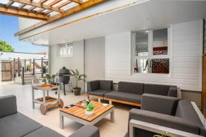Un lugar para sentarse en Sublime Villa Piscine - Trésor de la Baie