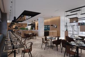 Restoran või mõni muu söögikoht majutusasutuses Four Points by Sheraton Warsaw Mokotow