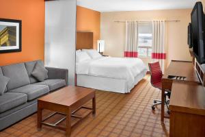 TV i/ili multimedijalni sistem u objektu Four Points by Sheraton Edmonton Gateway