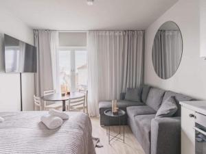 Una cama o camas en una habitación de 4 person Studio in Sölvesborg
