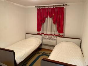 Ένα ή περισσότερα κρεβάτια σε δωμάτιο στο Apartman Nikola